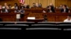 The witness chair reserved for Attorney General William Barr sits empty as Chairman Jerrold Nadler, D-N.Y., center background, gives his opening statement at a House Judiciary Committee hearing on Capitol Hill in Washington, May 2, 2019.