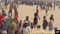 FILE - People who fled their homes due to violence from the Islamic extremists group Boko Haram are seen inside a refugee camp in Minawao, Cameroon, Feb. 25, 2015. Humanitarian challenges continue to mount in Cameroon, as refugees continue to flow in from Nigeria and the Central African Republic.