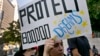 An unidentified student joins a rally in support of the Deferred Action for Childhood Arrivals, or DACA program, outside the Edward Roybal Federal Building in downtown Los Angeles, Sept. 1, 2017.
