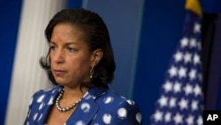 FILE - In this July 22, 2015, photo, Susan Rice, at the time national security adviser to former president Barack Obama, participates in a briefing at the White House in Washington. President Donald Trump suggests Rice spied on conversations his aides had with foreign nationals last year.