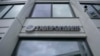 FILE - The logo of Russia's Gazprombank, a subsidiary of state energy giant Gazprom, is seen at its office in Moscow, April 27, 2022. 