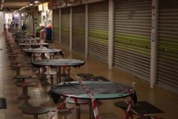 Stalls are shuttered at Hong Lim Hawker Centre in Singapore, May 10, 2020, amid the coronavirus outbreak. COVID-19 cases in Singapore recently spiked to 700 to 800 per day.