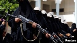 To show their support for the Houthi movement, women participate in a parade in Sana'a, Yemen, Sept. 7, 2016. Western and Iranian officials note an increase in the flow of arms to the Iran-backed rebels.