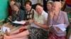 Women living with albinism attend a class at Women and Children with Albinism on the outskirts of Kampala, Uganda, to learn how to make organic soap as a means of earning a living.
