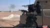 IS May Sustain Virtual Caliphate After Battlefield Losses, Experts Say