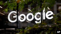 FILE - The Google logo is seen at Google offices in Granary Square, London, Nov. 1, 2018. 