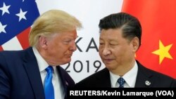 Presiden AS Donald Trump bertemu Presiden China Presiden China Xi Jinping sebelum memulai pertemuan bilateral di sela-sela KTT G20 di Osaka, Jepang, 29 Juni 2019.