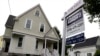 FILE - A home is for sale in Andover, Massachusetts, May 24, 2016.