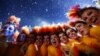 Performers pose after the end of closing ceremony of the London 2012 Olympic Games at the Olympic stadium August 12, 2012. 