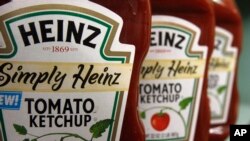 FILE - One of the most familiar products made by H.J. Heinz Co.is its signature ketchup.