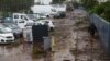 A man walks on a damaged street following Tropical Cyclone Garance in Saint-Denis, on the French overseas Indian Ocean island of Reunion, Feb. 28, 2025. 