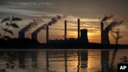 FILE - The coal-fired Plant Scherer is seen in Juliette, Ga., June 3, 2017. 