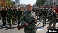 Pro-Russian Separatists March Ukrainian POWs Through Donetsk