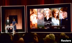FILE - Actor John Krasinski (L) and Academy of Motion Picture Arts and Sciences President Cheryl Boone Isaacs announce the nominees for the Best Actress in a Supporting Role during the nominations announcements for the 88th Academy Awards in Beverly Hills, Calif.