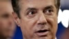 Trump Campaign Chairman Paul Manafort talks to reporters on the floor of the Republican National Convention at Quicken Loans Arena in Cleveland, Ohio, July 17, 2016.