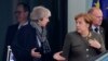 Rencontre de Theresa May avec la chancelière allemande Angela Merkel, à Berlin, en Allemagne, le mardi 9 avril 2019. (AP Photo/Markus Schreiber)