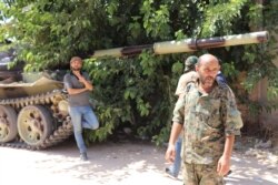 World powers say there is no military solution to the Libya crisis, urging all parties to return to negotiations, but the fighting continues in Tripoli, July 7, 2019. (H.Murdock/VOA)