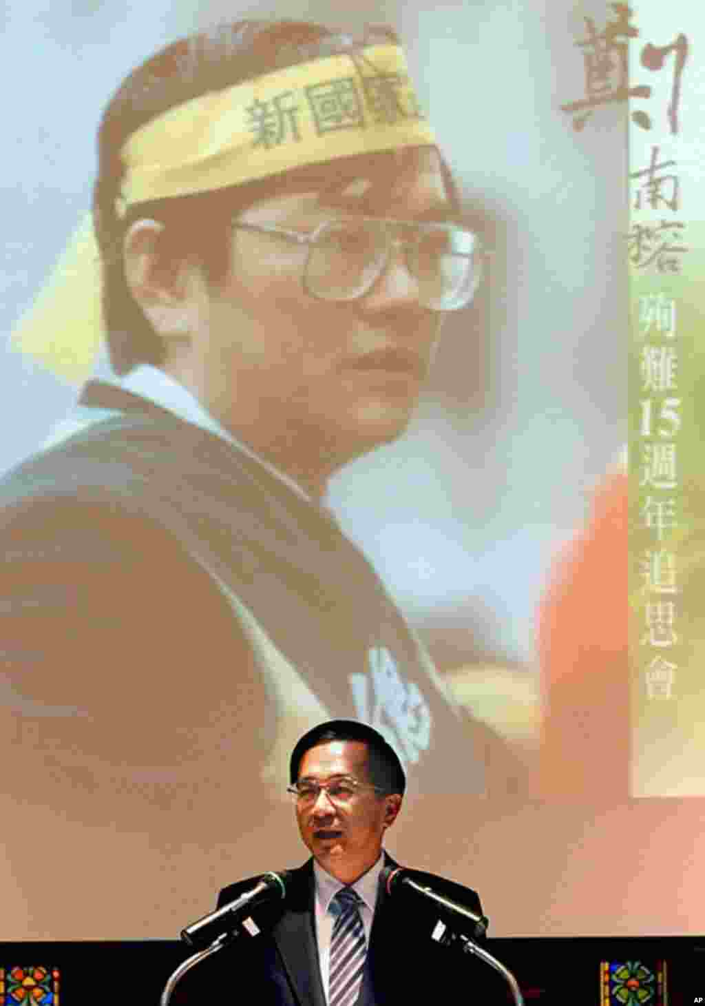 Taiwan President Chen Shui-bian speaks during a trip to pay a tribute to Cheng Nan-jung (pictured top), a Taiwan independence activist, while visiting his tomb on the 15th anniversary of his death, at Chinshan outside Taipei. Cheng died in 1989 after he