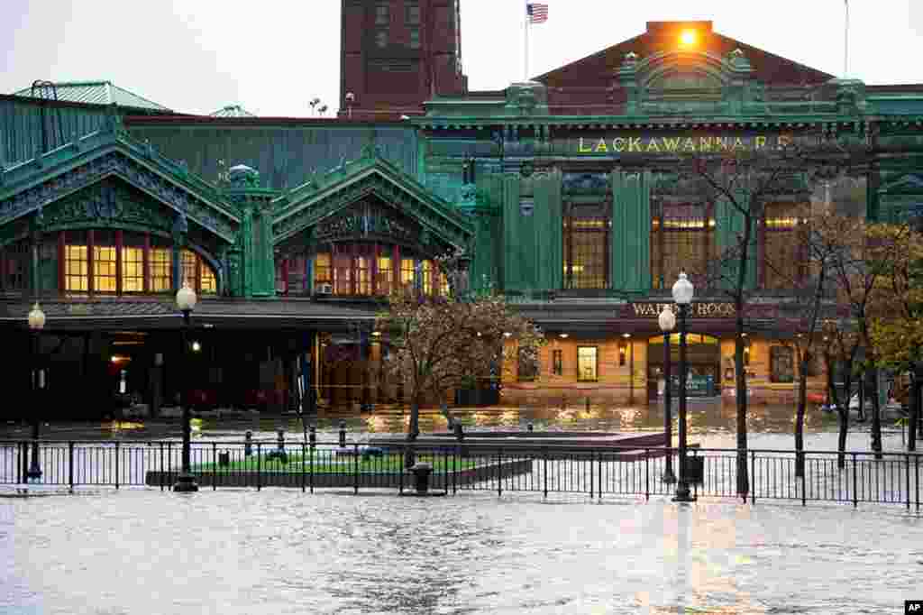 The Hudson River swells and rises over its banks flooding the Lackawanna train station as Hurricane Sandy approaches Hoboken, New Jersey.