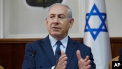 Israeli Prime Minister Benjamin Netanyahu chairs the weekly cabinet meeting at his office in Jerusalem, Jan. 7, 2018. 