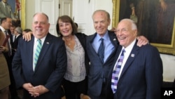 Maryland Gov. Larry Hogan, left, poses with Goody Finkelstein, former Del. Richard Rynd and lobbyist Bruce Bereano after a news conference Oct. 23, 2017, in Annapolis after Hogan signed an executive order barring the state from awarding contracts to companies that support boycotts of Israel. 