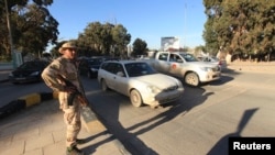 Security officer patrols Benghazi, Feb. 12, 2013.