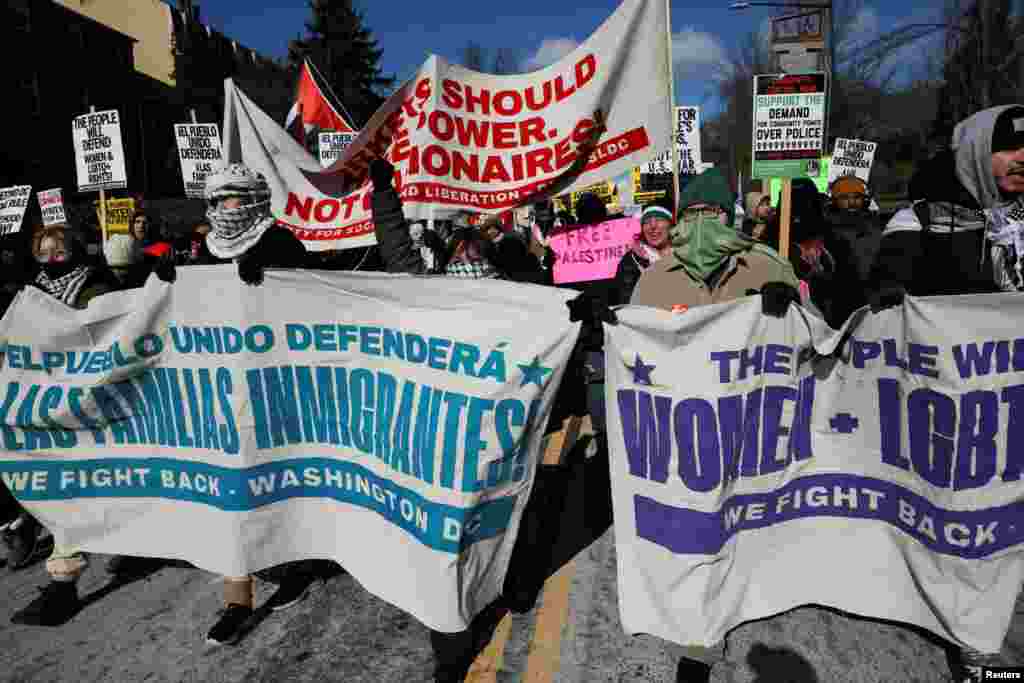 People march during a protest held on the day of the inauguration of U.S. President Donald Trump, in Washington, Jan. 20, 2025.