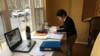 USA: Double Duties of a Working Mom With 2 Kids  