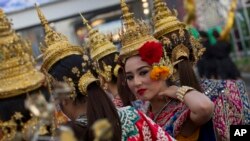 A Thai dancer performs during a parade held Wednesday, Jan. 14, 2015.