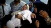 Palestinians Rally for Gaza Funerals 