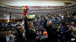 Anti-government lawmakers shout "Fraud," during a session of Venezuela's National Assembly, in Caracas, Venezuela, Aug. 2, 2017. 
