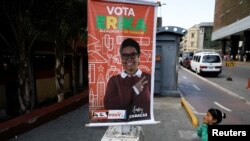 Campaign posters for Erika Farias, a pro-government candidate for mayor of Caracas' Libertador district, hang in the Venezuelan capital. 