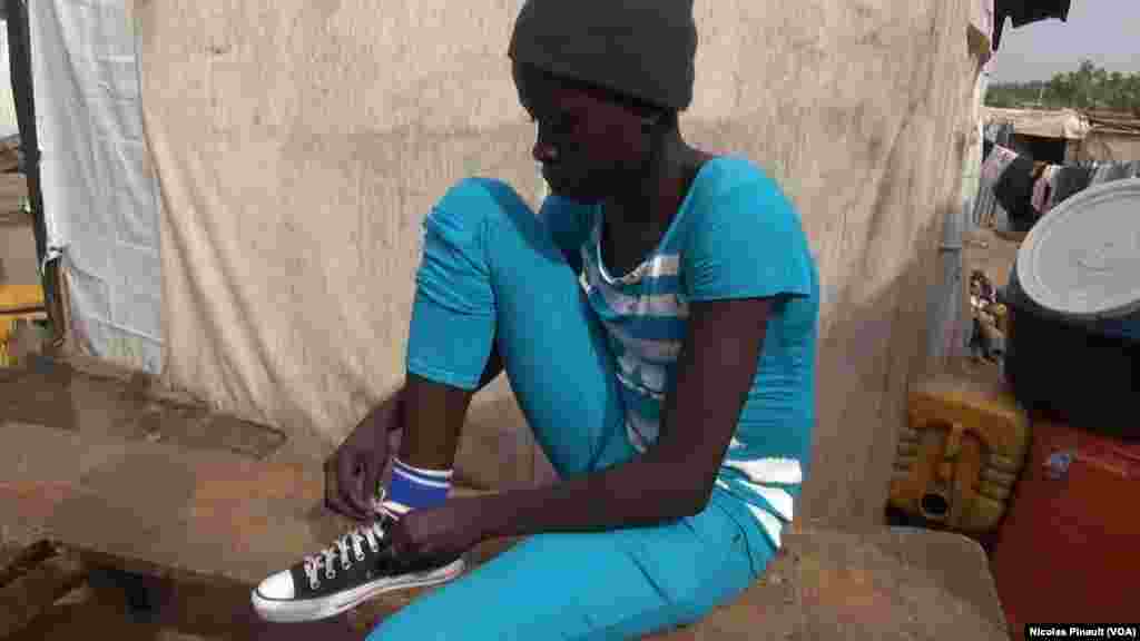 Lami John Ta Tsere Daga Gwoza A Jahar Borno Bayan 'Yan Kungiyar Boko Haram Sun Kaima Kauyen Su Hari, An Yi Garkuwa Da Ita Har Na Kwanaki Goma Sha Biyar Byan Yayin Da Suka Harbe Ta A Kafa. 