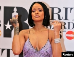 Rihanna arrives at the BRIT Awards at the O2 arena in London, Feb. 24, 2016.