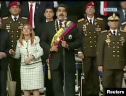 Venecuelanski predsednik, Nikolas Maduro, reaguje tokom događaja koji je bio prekinut, navodno eksplozijom drona, na ovom isečku video snimka koji je snimila vlada, 4. avgusta 2018. u Karakasu, Venecuela.