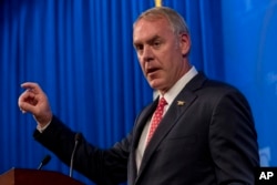 FILE - Interior Secretary Ryan Zinke speaks at the Heritage Foundation in Washington, Sept. 29, 2017.