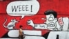Seorang perempuan berjalan melewati tembok berhias grafiti yang menunjukkan dukungan terhadap gerakan anti korupsi pemerintah di Jakarta, 20 Juli 2010. (Foto: AFP/Bay ISMOYO)