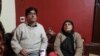 The family of jailed photojournalist Manan Gulzar Dar, pictured at the family's home in the Batamaloo locality of Srinagar in Kashmir. (Bilal Hussein/VOA)