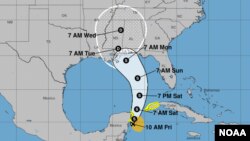 An approximate representation of coastal areas under a hurricane tropical storm watch (yellow). The orange circle indicates the current position of the center of the tropical cyclone. (NOAA/NWS)