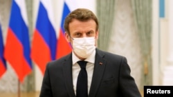 Russian President Vladimir Putin meets with French President Emmanuel Macron in Moscow