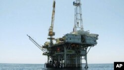 FILE - Platform Holly, an oil drilling rig in the Santa Barbara Channel offshore of Goleta, Calif., will be decommissioned and its operator is seeking bankruptcy protection nearly two years after the platform was idled when an onshore pipeline ruptured and spilled a massive amount of oil into the ocean, the state and Venoco said April 17, 2017.