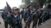 Des soldats de l'Union nationale karen pendant la célébration du 63e anniversaire du Jour de la révolution karen dans le village d'Oo Kray Kee dans l'État de Karen, près de la frontière entre le Myanmar/Birmanie, et la Thaïlande le 31 janvier 2012. (AFP/PORNCHAI KITTIWONGSAKUL)