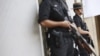 Police guarding an avenue in Singapore, June 4, 2010 