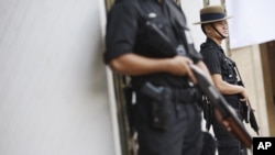 Police guarding an avenue in Singapore, June 4, 2010 