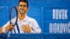 Lukisan mural petenis Serbia Novak Djokovic di Beograd, Serbia, Kamis, 6 Januari 2022. (AP Photo/Darko Vojinovic).