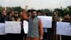 Supporters of the Pashtun Tahafuz Movement (PTM) chant slogans against the murder of a senior police officer after he disappeared from Pakistan's capital city last month, during a protest in Islamabad, Pakistan, Nov.15, 2018. 