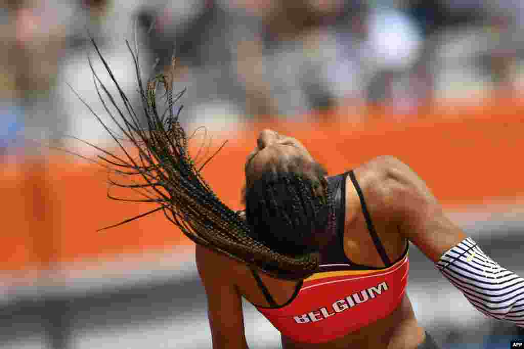Belgium's Nafissatou Thiam competes in the Women's High Jump qualification round during the European Athletics Championships at the Olympic stadium in Amsterdam.