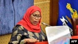 FILE - Tanzania's new President Samia Suluhu Hassan addresses the national assembly at the Parliament in Dodoma, Tanzania, on April 22, 2021. 