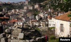 FILE - A general view shows Kasab after rebel fighters seized it, March 24, 2014.