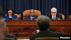 FILE - US Representatives John Lewis, Suzan DelBene, and Mike Kelly, preside over a House Ways and Means Committee Oversight Subcommittee hearing on whether to compel candidates for US president and vice president to release tax records, Feb. 7, 2019.